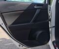 Білий Мазда 3, об'ємом двигуна 2 л та пробігом 256 тис. км за 7500 $, фото 9 на Automoto.ua