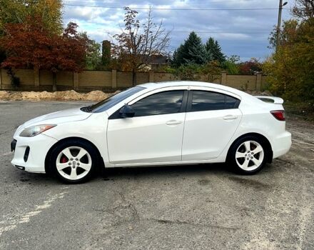 Белый Мазда 3, объемом двигателя 2 л и пробегом 200 тыс. км за 7500 $, фото 1 на Automoto.ua