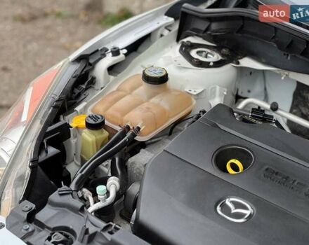 Белый Мазда 3, объемом двигателя 2 л и пробегом 200 тыс. км за 7900 $, фото 18 на Automoto.ua