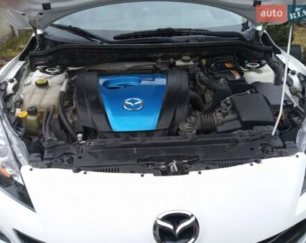 Белый Мазда 3, объемом двигателя 2 л и пробегом 252 тыс. км за 8300 $, фото 17 на Automoto.ua