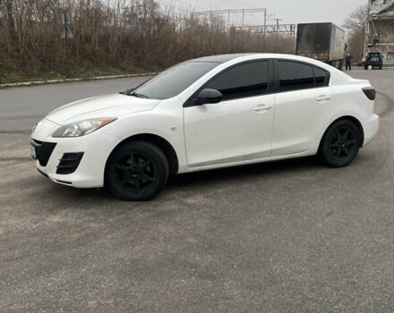 Белый Мазда 3, объемом двигателя 2 л и пробегом 158 тыс. км за 7600 $, фото 1 на Automoto.ua