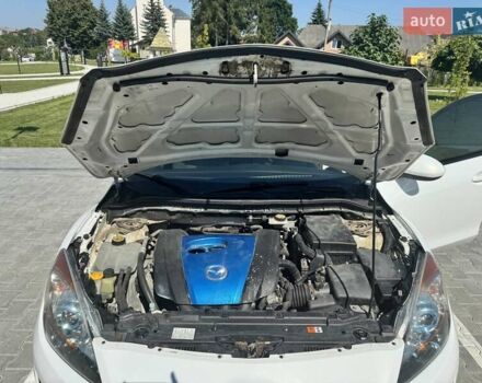 Білий Мазда 3, об'ємом двигуна 2 л та пробігом 186 тис. км за 8000 $, фото 9 на Automoto.ua