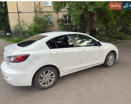 Белый Мазда 3, объемом двигателя 2 л и пробегом 182 тыс. км за 8300 $, фото 1 на Automoto.ua
