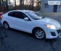 Белый Мазда 3, объемом двигателя 2 л и пробегом 235 тыс. км за 6600 $, фото 1 на Automoto.ua