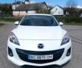 Белый Мазда 3, объемом двигателя 2 л и пробегом 190 тыс. км за 7000 $, фото 1 на Automoto.ua