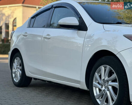 Белый Мазда 3, объемом двигателя 2 л и пробегом 165 тыс. км за 8000 $, фото 8 на Automoto.ua