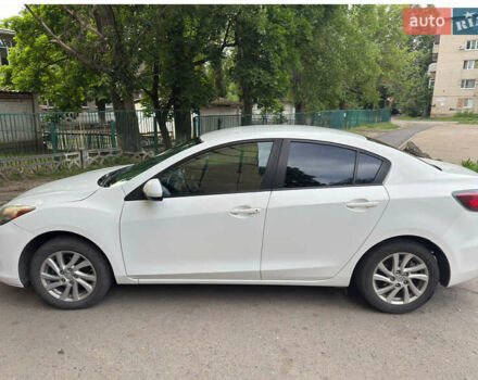 Белый Мазда 3, объемом двигателя 2 л и пробегом 182 тыс. км за 8300 $, фото 3 на Automoto.ua