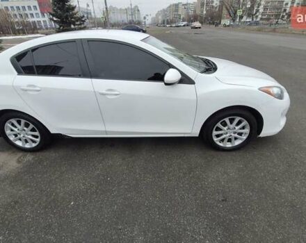 Белый Мазда 3, объемом двигателя 2 л и пробегом 231 тыс. км за 8200 $, фото 2 на Automoto.ua