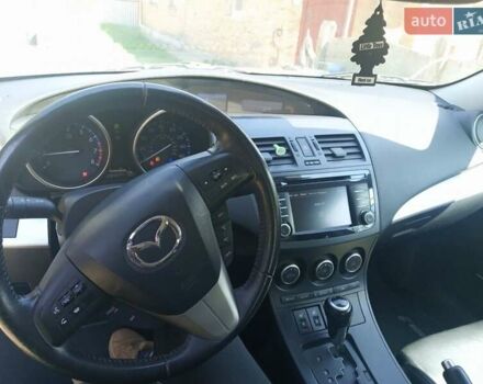 Белый Мазда 3, объемом двигателя 2 л и пробегом 252 тыс. км за 8300 $, фото 4 на Automoto.ua