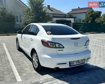 Білий Мазда 3, об'ємом двигуна 2 л та пробігом 186 тис. км за 8000 $, фото 4 на Automoto.ua
