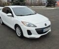 Белый Мазда 3, объемом двигателя 2 л и пробегом 231 тыс. км за 8200 $, фото 1 на Automoto.ua