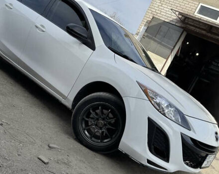 Белый Мазда 3, объемом двигателя 2 л и пробегом 234 тыс. км за 7000 $, фото 2 на Automoto.ua