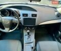 Белый Мазда 3, объемом двигателя 2 л и пробегом 130 тыс. км за 7481 $, фото 1 на Automoto.ua