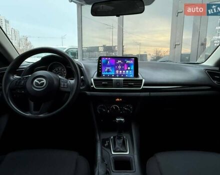 Білий Мазда 3, об'ємом двигуна 2 л та пробігом 195 тис. км за 10490 $, фото 12 на Automoto.ua