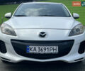 Белый Мазда 3, объемом двигателя 2 л и пробегом 170 тыс. км за 8400 $, фото 1 на Automoto.ua