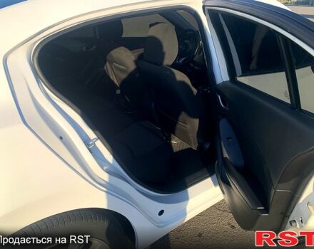 Белый Мазда 3, объемом двигателя 2 л и пробегом 303 тыс. км за 10000 $, фото 9 на Automoto.ua