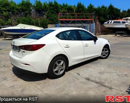 Белый Мазда 3, объемом двигателя 2 л и пробегом 193 тыс. км за 9900 $, фото 3 на Automoto.ua