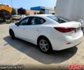 Белый Мазда 3, объемом двигателя 2 л и пробегом 193 тыс. км за 9900 $, фото 2 на Automoto.ua