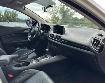 Білий Мазда 3, об'ємом двигуна 2 л та пробігом 136 тис. км за 9600 $, фото 11 на Automoto.ua