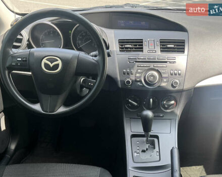 Белый Мазда 3, объемом двигателя 2 л и пробегом 170 тыс. км за 8400 $, фото 32 на Automoto.ua