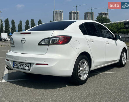 Белый Мазда 3, объемом двигателя 2 л и пробегом 170 тыс. км за 8400 $, фото 21 на Automoto.ua