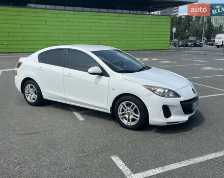 Белый Мазда 3, объемом двигателя 2 л и пробегом 170 тыс. км за 8400 $, фото 28 на Automoto.ua