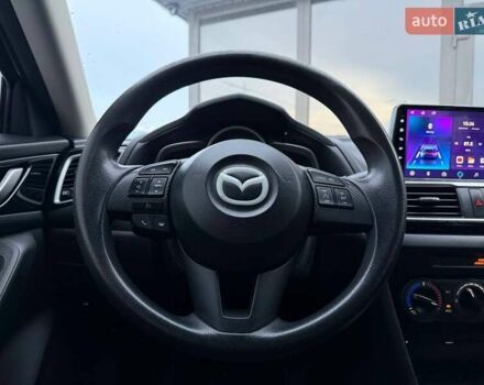 Білий Мазда 3, об'ємом двигуна 2 л та пробігом 195 тис. км за 10490 $, фото 14 на Automoto.ua
