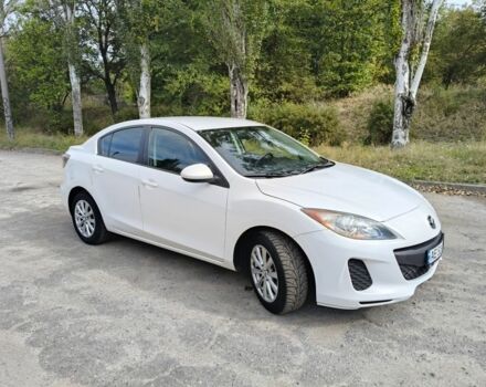 Белый Мазда 3, объемом двигателя 2 л и пробегом 220 тыс. км за 6032 $, фото 1 на Automoto.ua