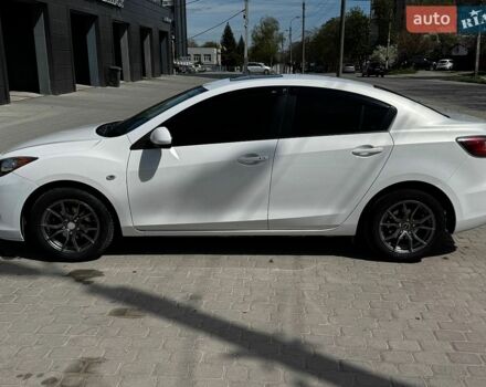 Білий Мазда 3, об'ємом двигуна 2 л та пробігом 115 тис. км за 9000 $, фото 2 на Automoto.ua