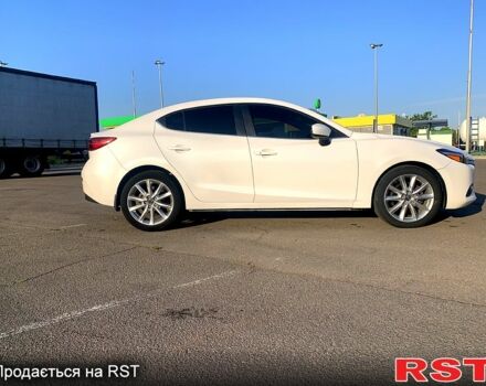 Белый Мазда 3, объемом двигателя 2 л и пробегом 303 тыс. км за 10000 $, фото 3 на Automoto.ua