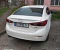 Белый Мазда 3, объемом двигателя 2 л и пробегом 210 тыс. км за 9496 $, фото 2 на Automoto.ua