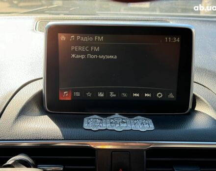 Белый Мазда 3, объемом двигателя 2 л и пробегом 158 тыс. км за 10890 $, фото 28 на Automoto.ua