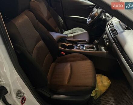 Белый Мазда 3, объемом двигателя 1.5 л и пробегом 56 тыс. км за 14000 $, фото 20 на Automoto.ua