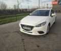 Белый Мазда 3, объемом двигателя 2 л и пробегом 144 тыс. км за 9500 $, фото 1 на Automoto.ua