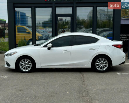 Белый Мазда 3, объемом двигателя 2 л и пробегом 208 тыс. км за 8899 $, фото 2 на Automoto.ua