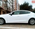 Белый Мазда 3, объемом двигателя 2 л и пробегом 148 тыс. км за 10300 $, фото 1 на Automoto.ua