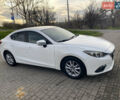 Білий Мазда 3, об'ємом двигуна 2 л та пробігом 150 тис. км за 9900 $, фото 1 на Automoto.ua