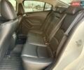 Белый Мазда 3, объемом двигателя 2 л и пробегом 140 тыс. км за 12500 $, фото 20 на Automoto.ua