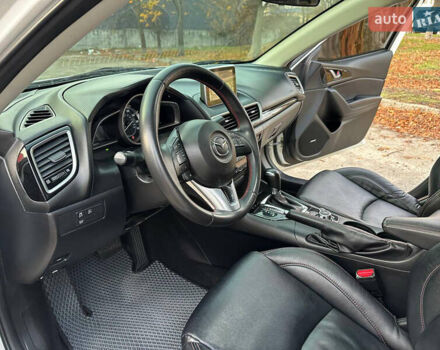 Білий Мазда 3, об'ємом двигуна 2 л та пробігом 276 тис. км за 7999 $, фото 7 на Automoto.ua