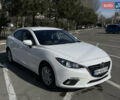 Белый Мазда 3, объемом двигателя 2 л и пробегом 152 тыс. км за 9900 $, фото 2 на Automoto.ua