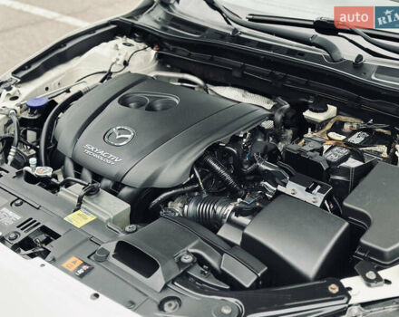 Белый Мазда 3, объемом двигателя 2 л и пробегом 208 тыс. км за 8899 $, фото 24 на Automoto.ua