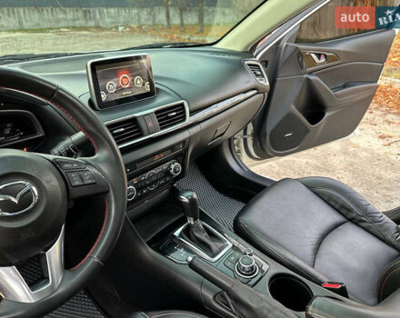 Білий Мазда 3, об'ємом двигуна 2 л та пробігом 276 тис. км за 7999 $, фото 8 на Automoto.ua