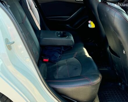 Белый Мазда 3, объемом двигателя 2 л и пробегом 158 тыс. км за 10890 $, фото 22 на Automoto.ua