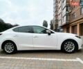 Белый Мазда 3, объемом двигателя 2 л и пробегом 148 тыс. км за 10300 $, фото 2 на Automoto.ua