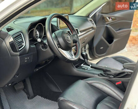 Білий Мазда 3, об'ємом двигуна 2 л та пробігом 276 тис. км за 7999 $, фото 10 на Automoto.ua