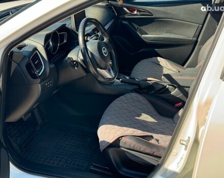 Белый Мазда 3, объемом двигателя 2 л и пробегом 158 тыс. км за 10890 $, фото 16 на Automoto.ua