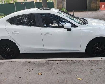 Белый Мазда 3, объемом двигателя 2 л и пробегом 157 тыс. км за 10200 $, фото 3 на Automoto.ua