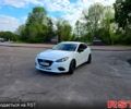 Белый Мазда 3, объемом двигателя 2 л и пробегом 95 тыс. км за 10600 $, фото 1 на Automoto.ua