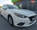 Белый Мазда 3, объемом двигателя 2 л и пробегом 248 тыс. км за 8900 $, фото 1 на Automoto.ua