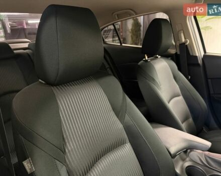 Білий Мазда 3, об'ємом двигуна 1.5 л та пробігом 60 тис. км за 13999 $, фото 27 на Automoto.ua